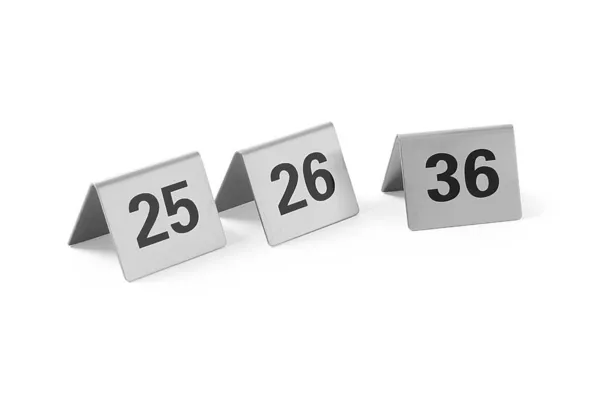 12 nummerdatud lauajalga komplektis vahemikus 25 kuni 36